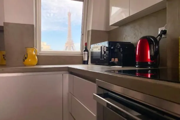 Les Toits De Rue Cler Vue Tour Eiffel شقة باريس